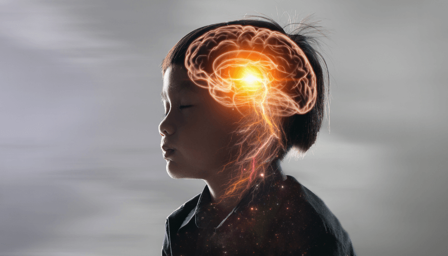 Ein Kind konzentriert sich mit geschlossenen Augen, und sein Gehirn leuchtet auf, als Ausdruck intensiver Konzentration.
